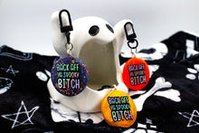 Messi Pups Halloweenie resin ghost charm with a spooky ghost prop back design, perfect for Halloween decorations or accessories.